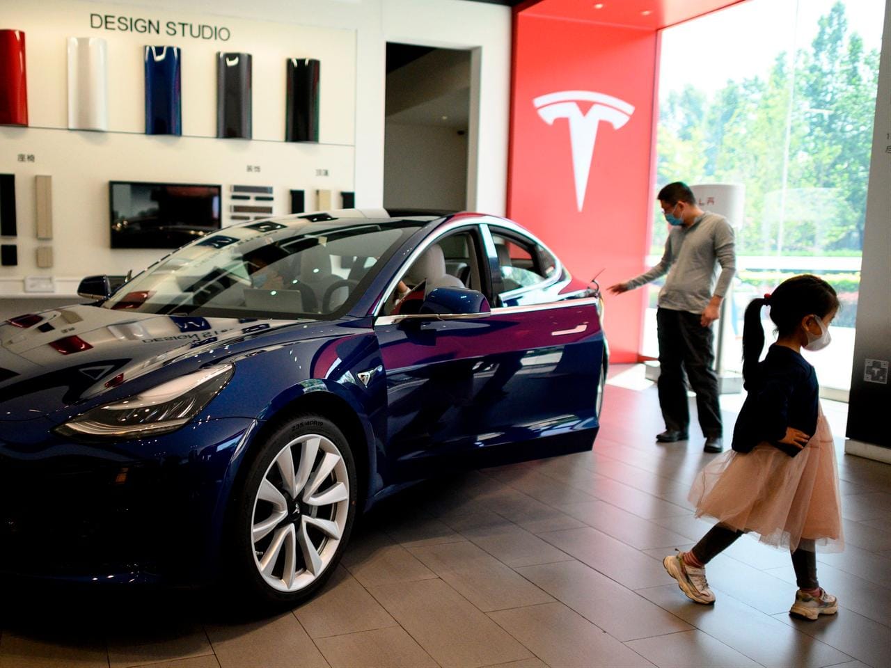 Tesla under US investigation over door lock failures, window-breaking incidents