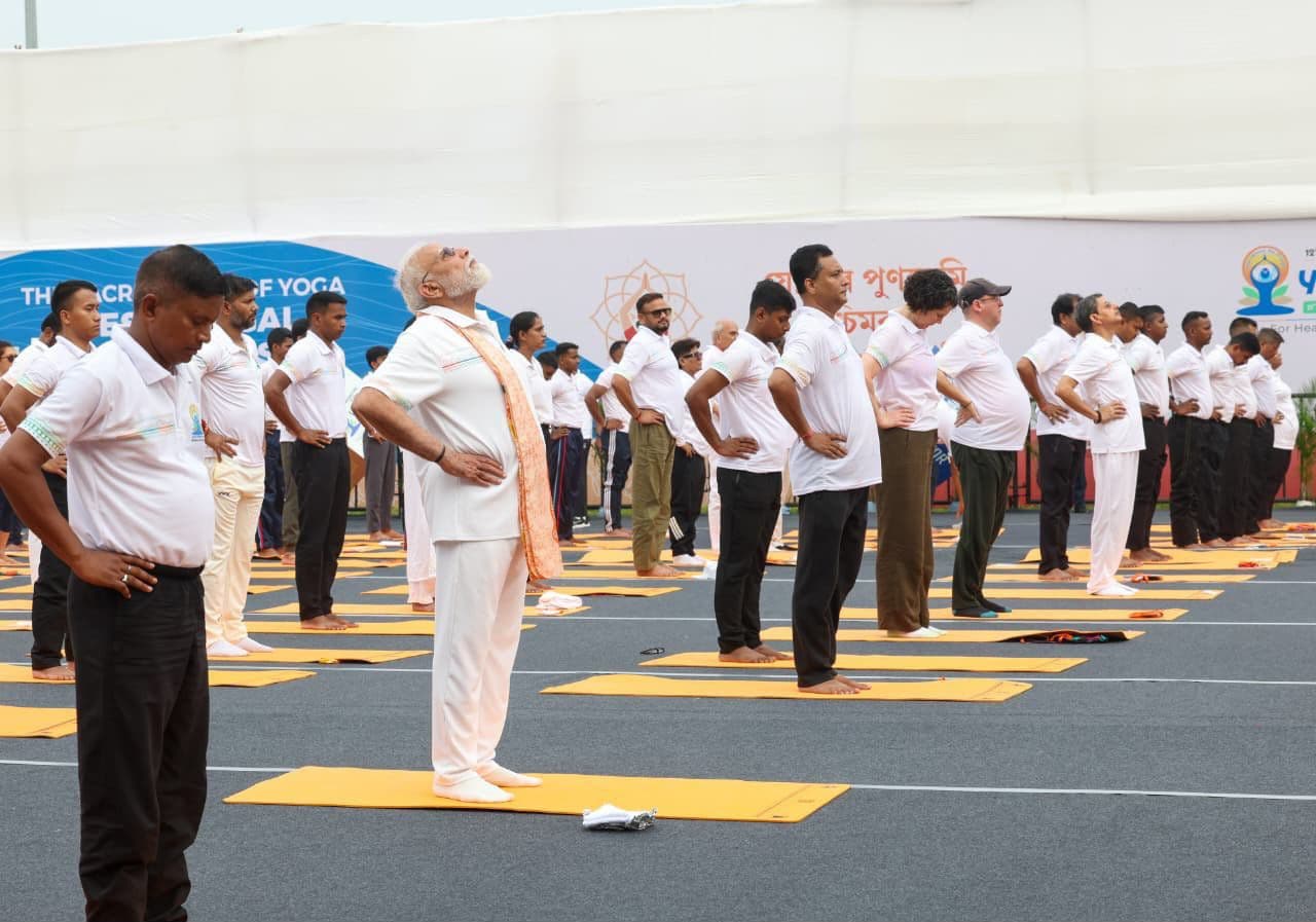 PM Modi performs yoga on International Kolkata Day held on Kolkata's Red road.