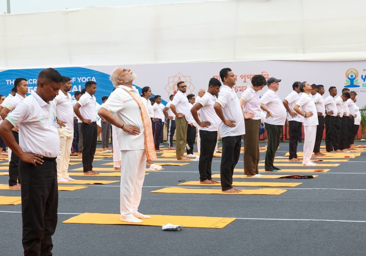 PM Modi performs yoga on International Kolkata Day held on Kolkata's Red road.