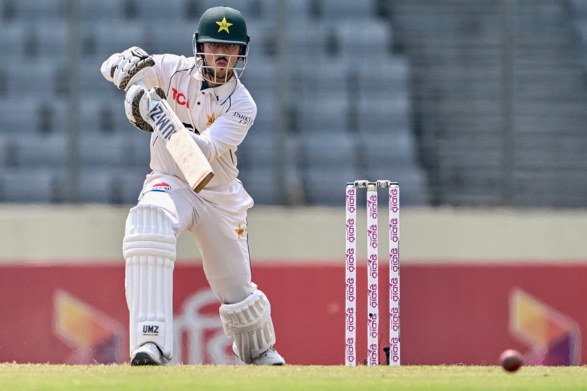 Pakistan's Azan Awais watches the ball after playing a shot during the third day of the first Test cricket match between Bangladesh and Pakistan at the Sher-e-Bangla National Stadium in Mirpur on May 10, 2026. (AFP)