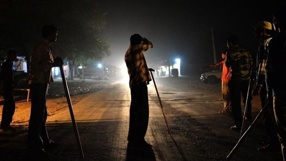 In this photograph taken on November 5, 2015, volunteers of the vigilante group of Gau Raksha Dal (Cow Protection Squad) gather to inspect a truck on a highway in Taranagar in the desert state of Rajasthan. (AFP)
