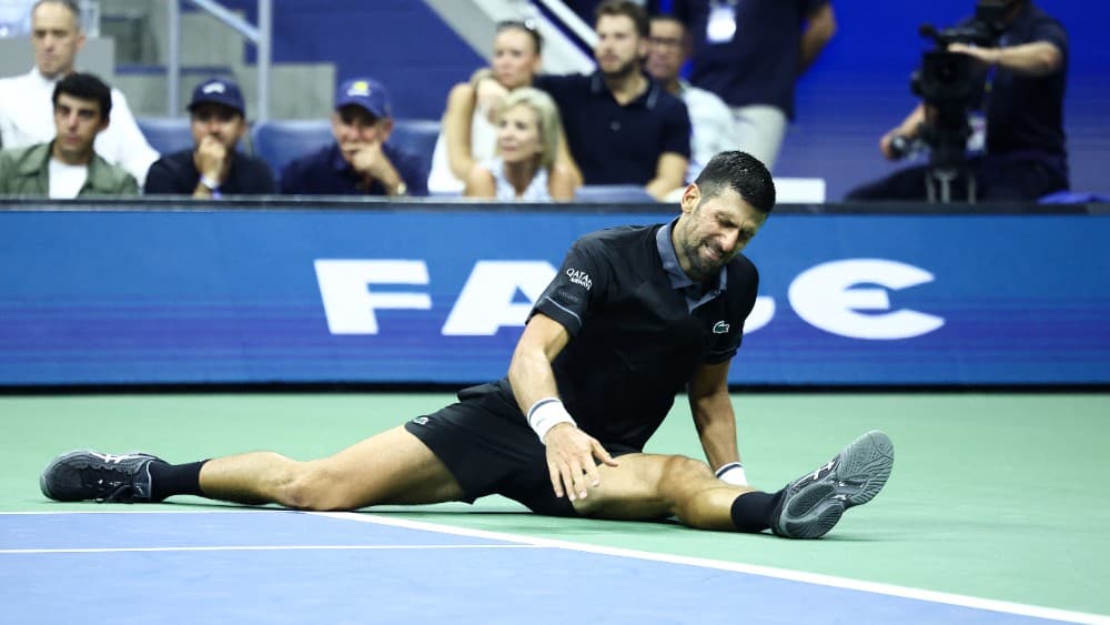 Serbia's Novak Djokovic reacts against Argentina's Mariano Navone during the men's singles first round tennis match on day one of the US Open tennis tournament at the USTA Billie Jean King National Tennis Center in New York City on August 30, 2026. (Photo