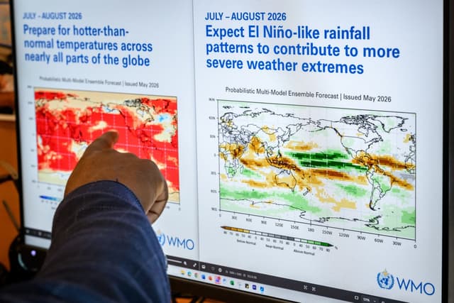 Head of climate prediction services at the World Meteorological Organization (WMO) Wilfran Moufouma-Okia points on graphs displayed on a computer screen at the WMO headquarters in Geneva, on June 1, 2026. (AFP)