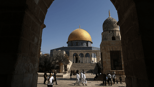 Muslim worshippers walk next to the Dome of the Rock mosque at the Al-Aqsa mosque compound in Jerusalem's Old City on October 17, 2025. (AFP)