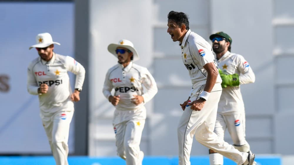Bowler Mohammad Abbas (C-R) of Pakistan celebrates after taking the wicket of Justin Greaves of West Indies for 20 runs during the third day of the first Test cricket match between West Indies and Pakistan at the Brian Lara Cricket Academy in Tarouba, Tri