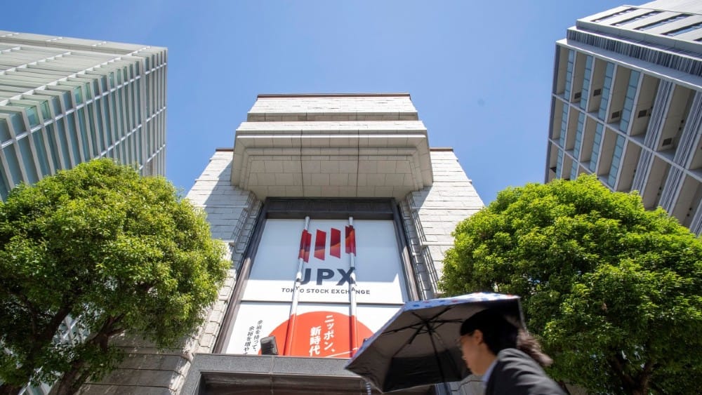 Asian stocks take another hit from AI, Mideast worries