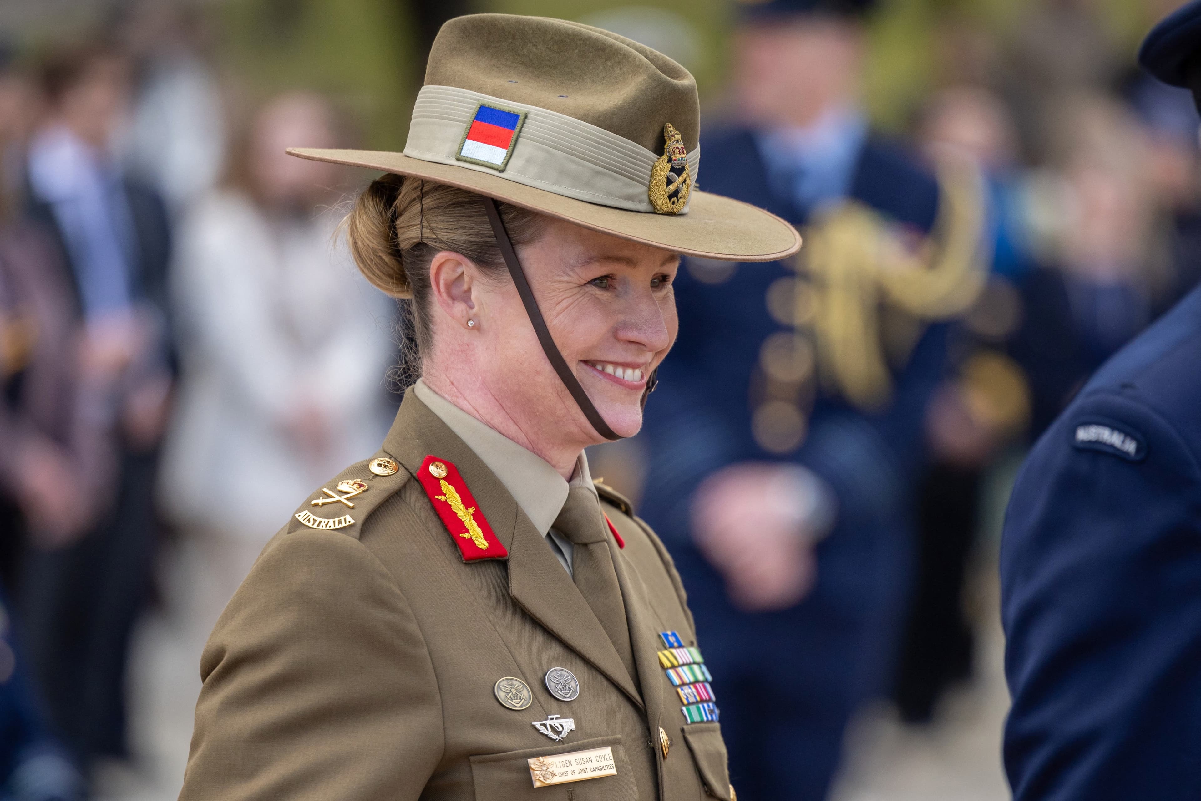 This handout photo from the Australian Defence Force taken on July 4, 2024, shows Lieutenant general Susan Coyle reacting as she attends an official event in Canberra. Coyle will command Australia's army for the first time since its founding 125 years ago
