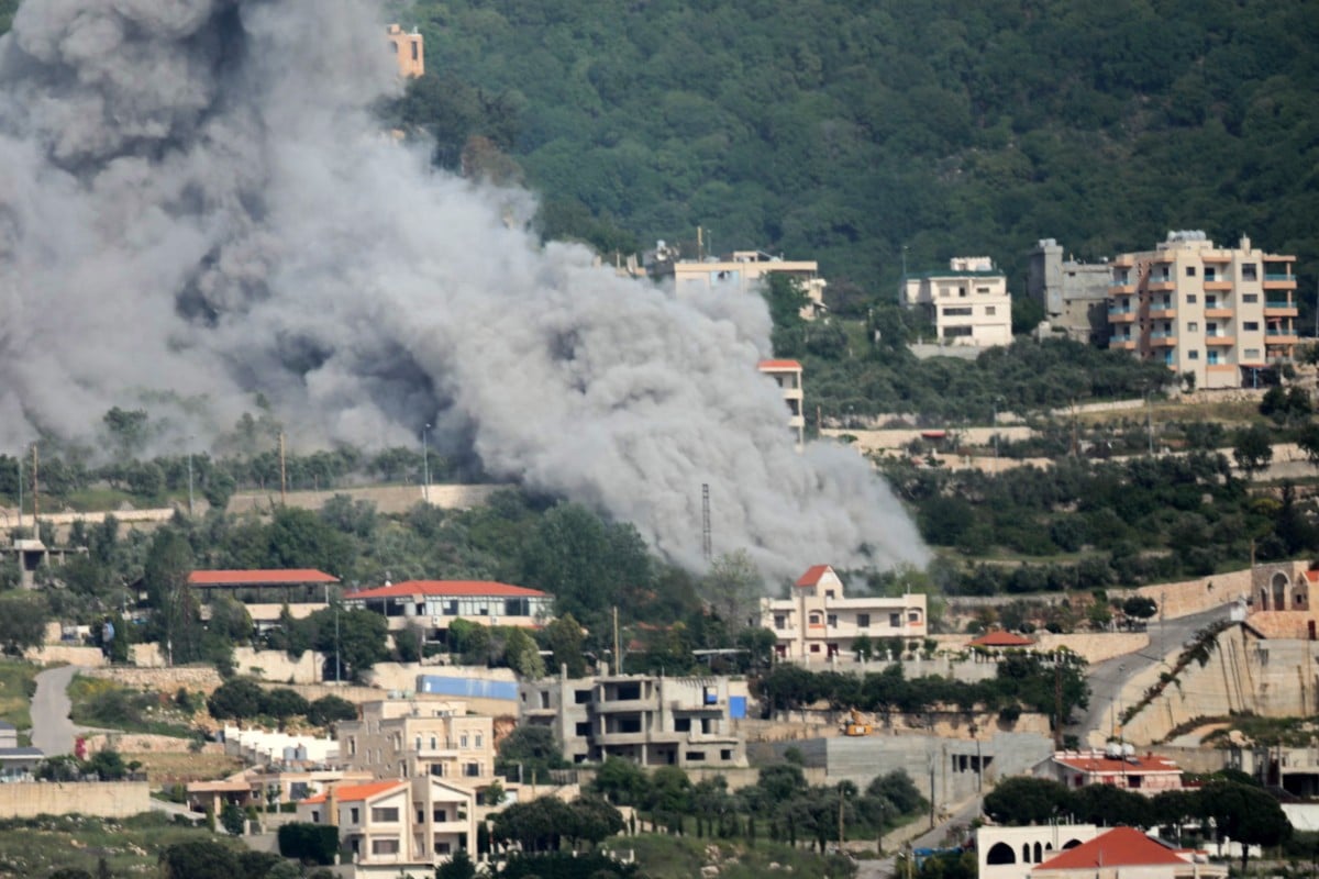 Smoke rises from the site of an Israeli airstrike that targeted the southern Lebanese village of Jarjouaa on May 13, 2026.