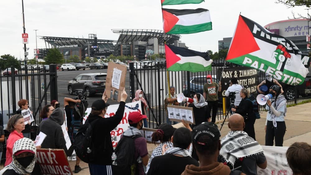 Pro-Palestinian protesters demonstrate near Lincoln Financial Field ahead of Ed Sheeran's concert in Philadelphia, Pennsylvania, on September 19, 2026, following the removal of rapper Macklemore from Sheeran's US tour. (Photo: AFP)