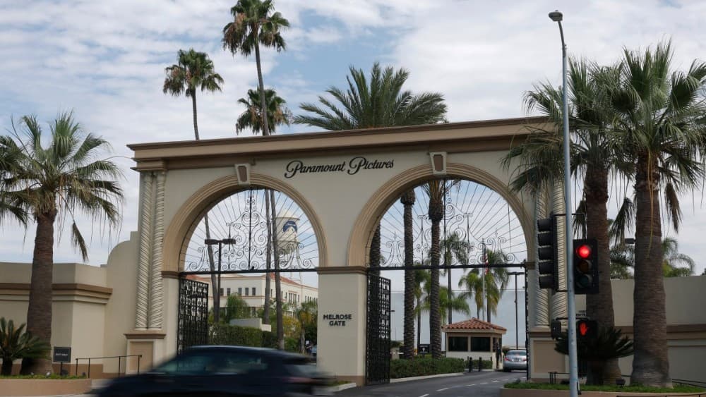 A car drives by the main gate at the Paramount Studios lot on July 13, 2026, in Los Angeles, California. (Photo: AFP)