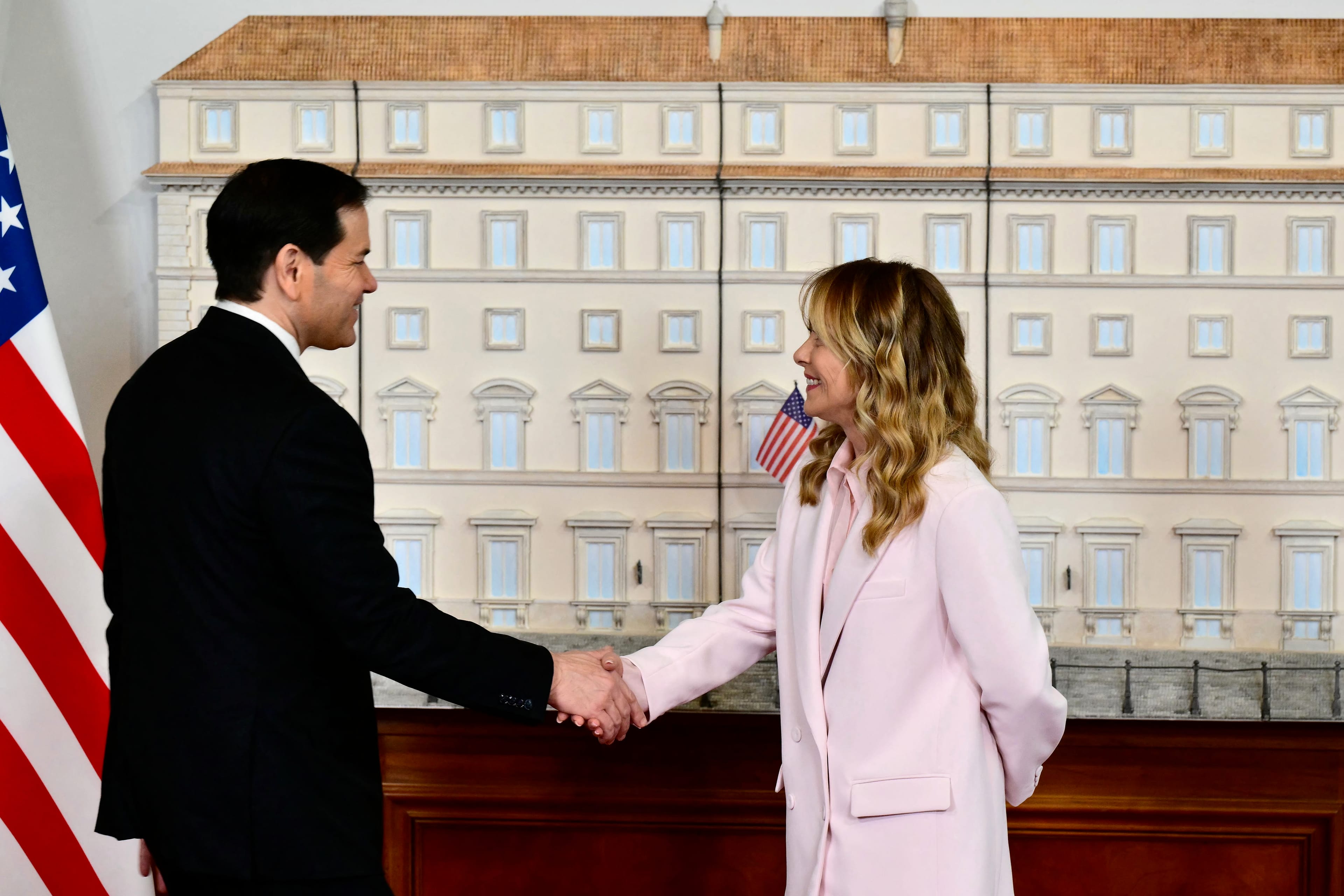 Italy's Prime Minister, Giorgia Meloni welcomes U.S. Secretary of State Marco Rubio during their meeting at Palazzo Chigi in Rome on May 8, 2026. (Photo by Stefano RELLANDINI / AFP)
