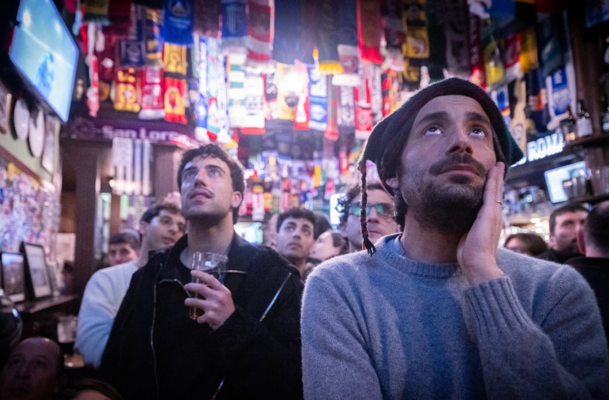 Italy supporters react as they watch in a pub the FIFA World Cup 2026 European qualification play-off final football match between Bosnia-Herzegovina and Italy, played in Bosnia, in central Rome on March 31, 2026.