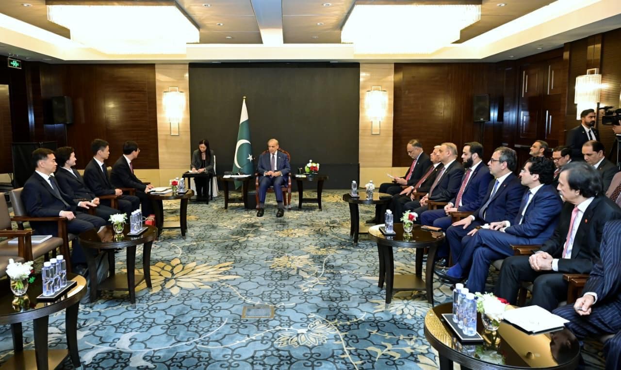 Pakistan Prime Minister Shehbaz Sharif speaks during a meeting with Chen Zhengjun, president and CEO of FAMSUN, in Beijing on May 26, 2026. (Handout/PMO)