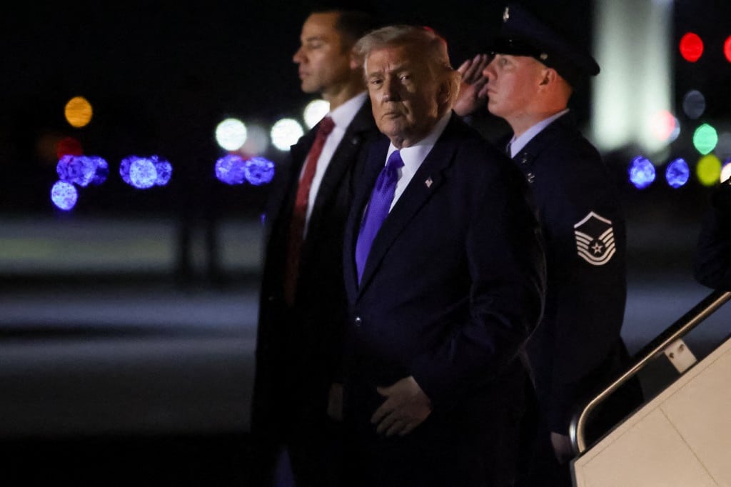 President Donald Trump steps off of Air Force One at Palm Beach International Airport on February 6, 2026 in Palm Beach, Florida. (Photo by Samuel Corum / GETTY IMAGES NORTH AMERICA / Getty Images via AFP)