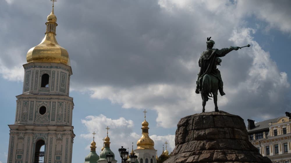 This photograph shows the Bohdan Khmelnytsky Monument (R) in front of the St. Sophia Cathedral and belltower in Kyiv on September 11, 2026, amid the Russian invasion of Ukraine. (Photo by GENYA SAVILOV / AFP)