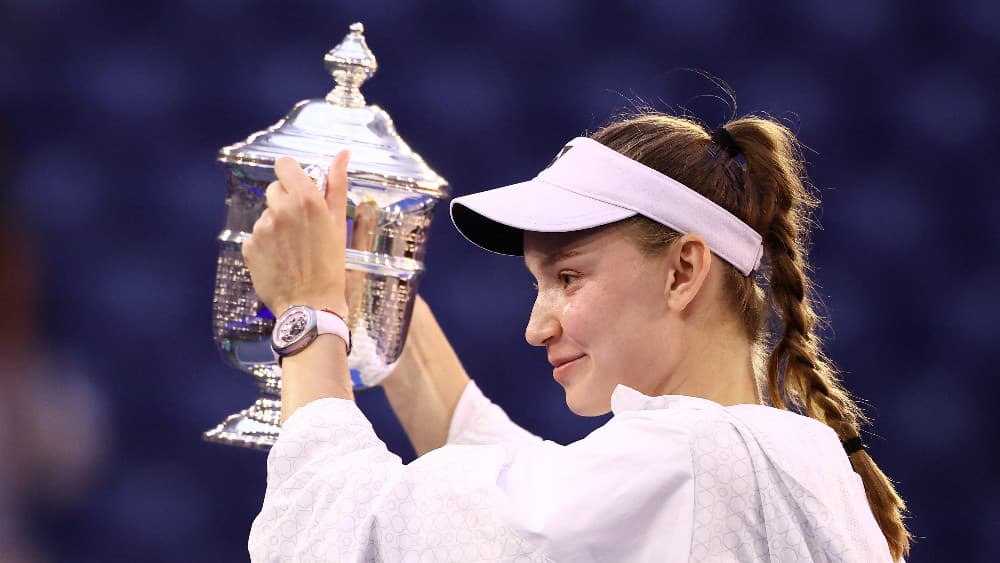 Kazakhstan's Elena Rybakina holds up the winner's trophy after winning the women's singles final tennis match against Belarus's Aryna Sabalenka on day 14 of the US Open tennis tournament at the USTA Billie Jean King National Tennis Center in New York City