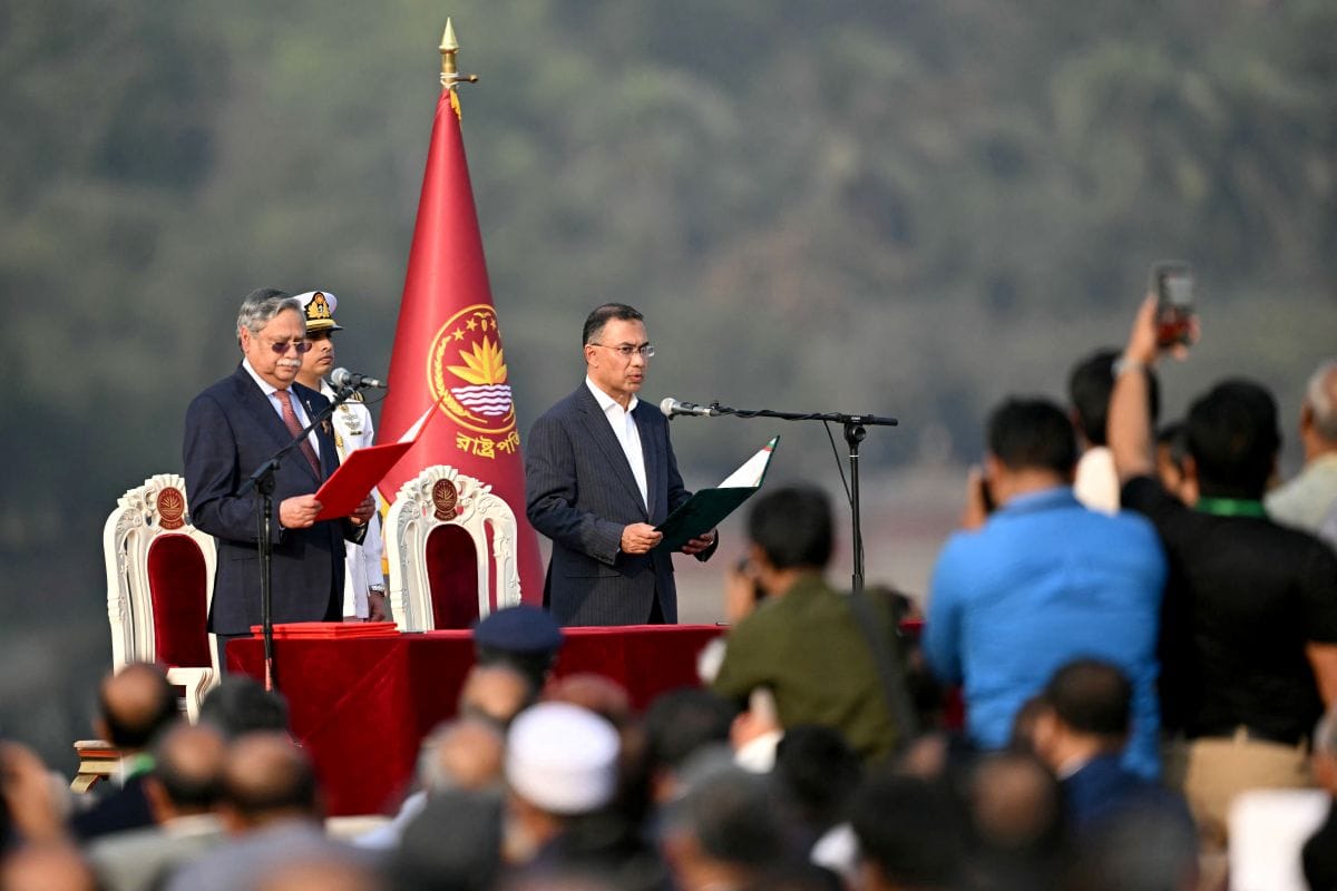 Bangladesh Nationalist Party (BNP) chairman Tarique Rahman (R) takes oath as prime minister during a swearing-in ceremony at the National Parliament building in Dhaka on February 17, 2026. (AFP)