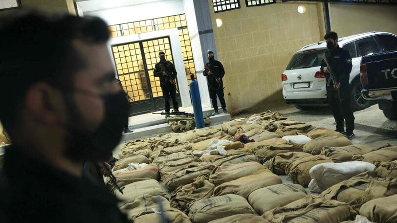 Syria state TV reports Jordanian strikes on drug, weapons storage in south