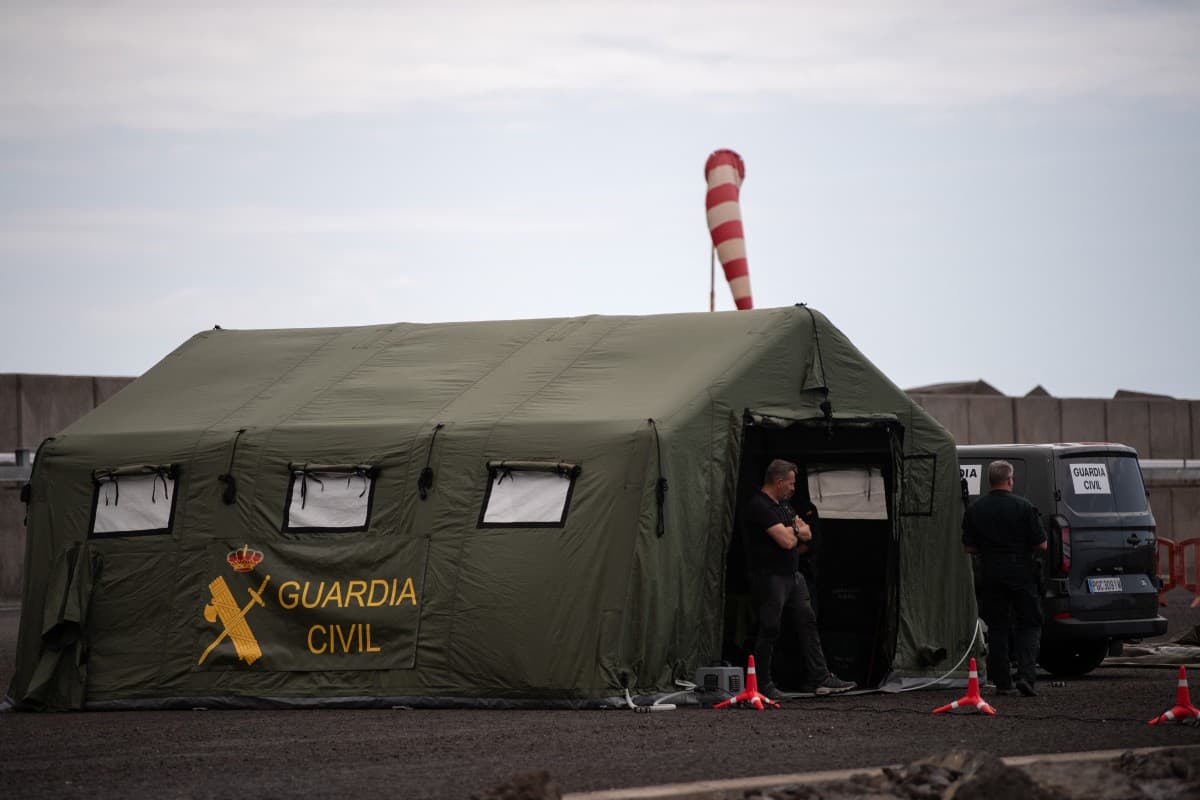 Members of the Spanish Civil Guard wait for the arrival of the Cruise MV Hondius at port of Granadilla de Abona on the island of Tenerife in Spain's Canary Islands on May 9, 2026. (AFP)