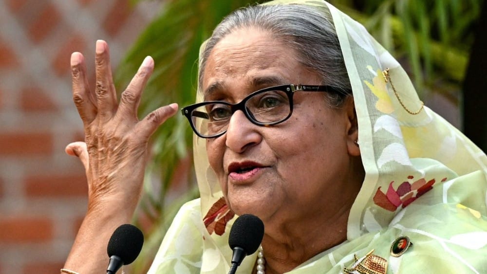 Bangladesh's ousted Prime Minister Sheikh Hasina gestures while speaking to the media, a day after she won the 12th parliamentary elections, in Dhaka, Bangladesh, Jan. 8, 2024. (AFP Photo/File)