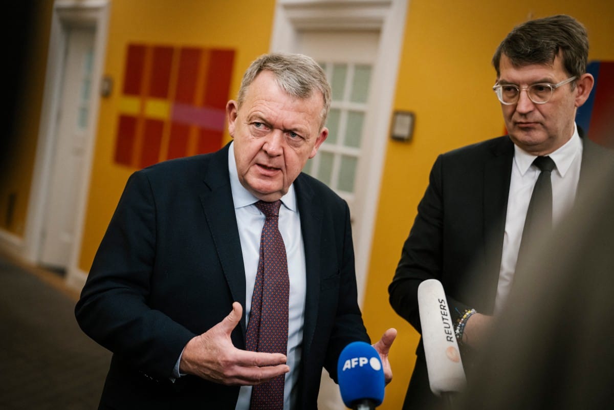Danish Foreign Minister Lars Loekke Rasmussen (L) and Danish Defense Minister Troels Lund Poulsen addresses journalists at a doorstep after a meeting of the Foreign Policy Committee at Christiansborg in Copenhagen, Denmark, on January 23, 2026.
