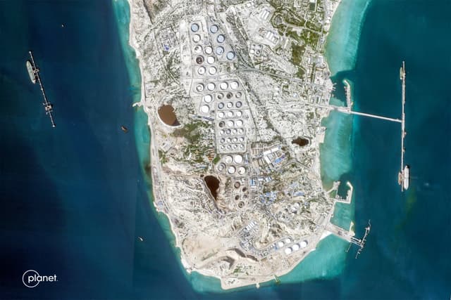 This handout satellite image taken by 2026 Planet Labs PBC shows a view of Iran's Kharg Island, which hosts the country’s main crude export terminal and is responsible for the overwhelming majority of its oil shipments to the world, (AFP)