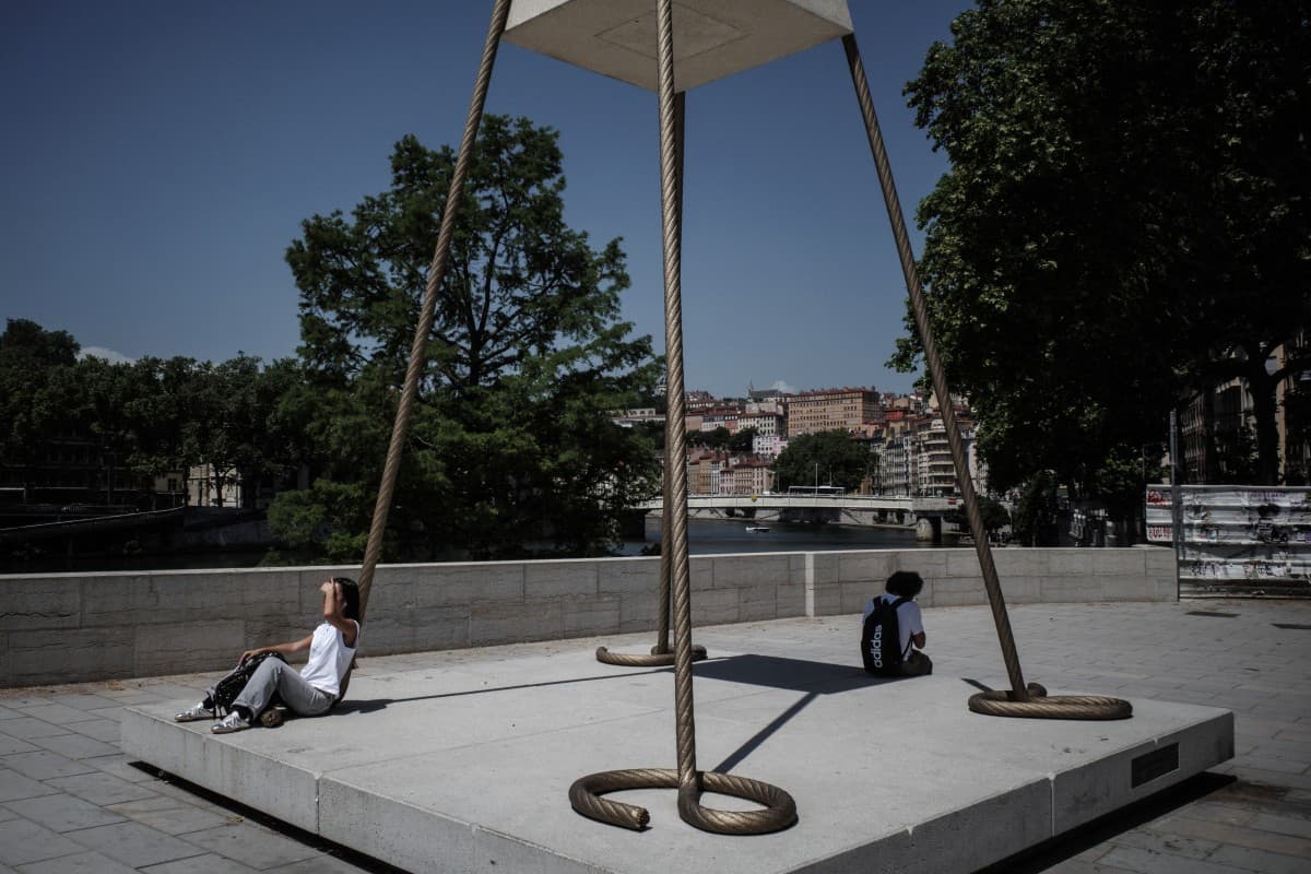France warns that strong storms could end deadly heatwave in Europe