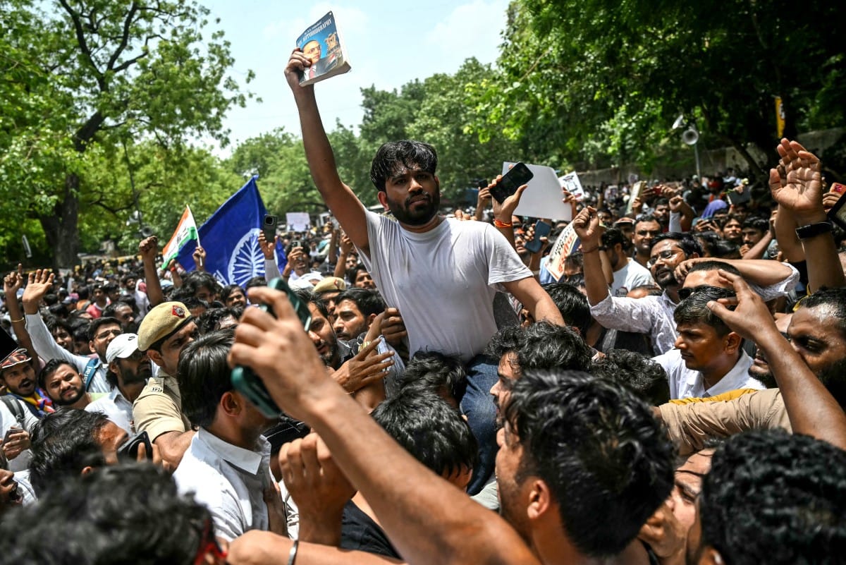 Cockroach Janta Party (CJP) founder Abhijeet Dipke (C) takes part in a protest over alleged irregularities in the country's major examinations, in New Delhi on June 6, 2026. (File photo: AFP)