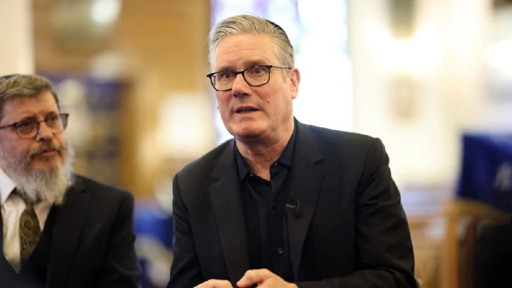 Britain's Prime Minister Keir Starmer talks during a visit to the Kenton district of London on April 23, 2026. (File photo: AFP)