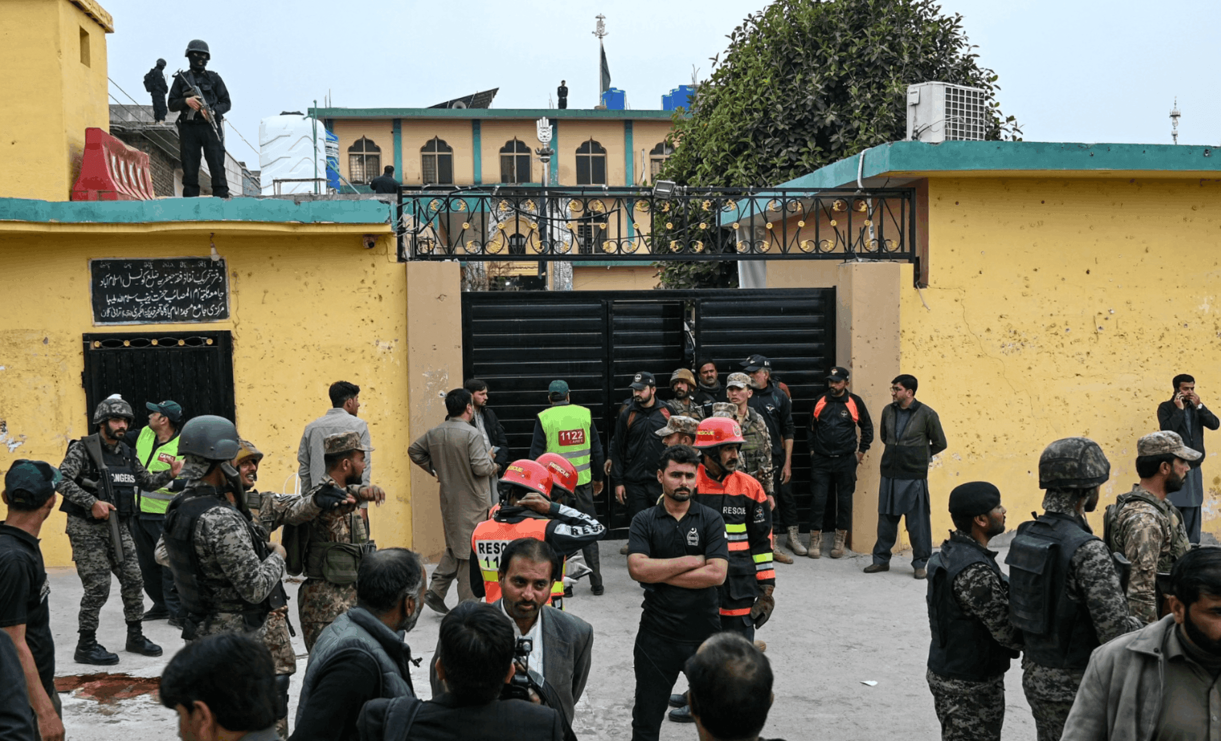 Security personnel stand guard outside a mosque following an explosion in Islamabad on February 6, 2026. (AFP)