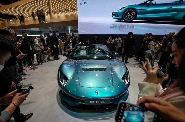 BYD-owned premium brand Denza Z model car is displayed at the Beijing Auto Show in Beijing on April 24, 2026. (AFP)