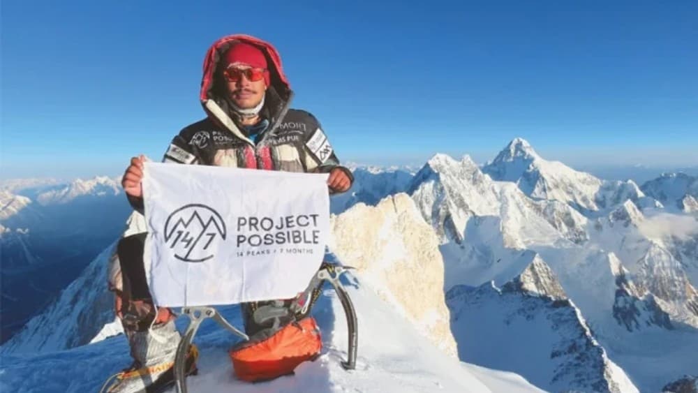 This photo released by Bremont Project Possible shows Nirmal Purja at the summit of Gasherbrum II in Gilgit-Baltistan.(File/AFP)