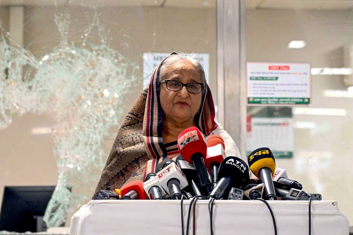In this handout photograph taken and released on July 25, 2024 by Bangladesh Prime Minister's Office, Prime Minister Sheikh Hasina addresses the media at a vandalized metro station in Mirpur, after the anti-quota protests. (AFP)