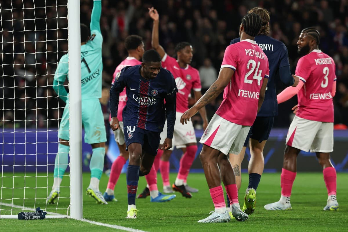 Paris Saint-Germain's French forward #10 Ousmane Dembele (L) celebrates after scoring his team's second goal during the French L1 football match between Paris Saint-Germain (PSG) and Toulouse FC at the Parc des Princes stadium in Paris on April 3, 2026. (