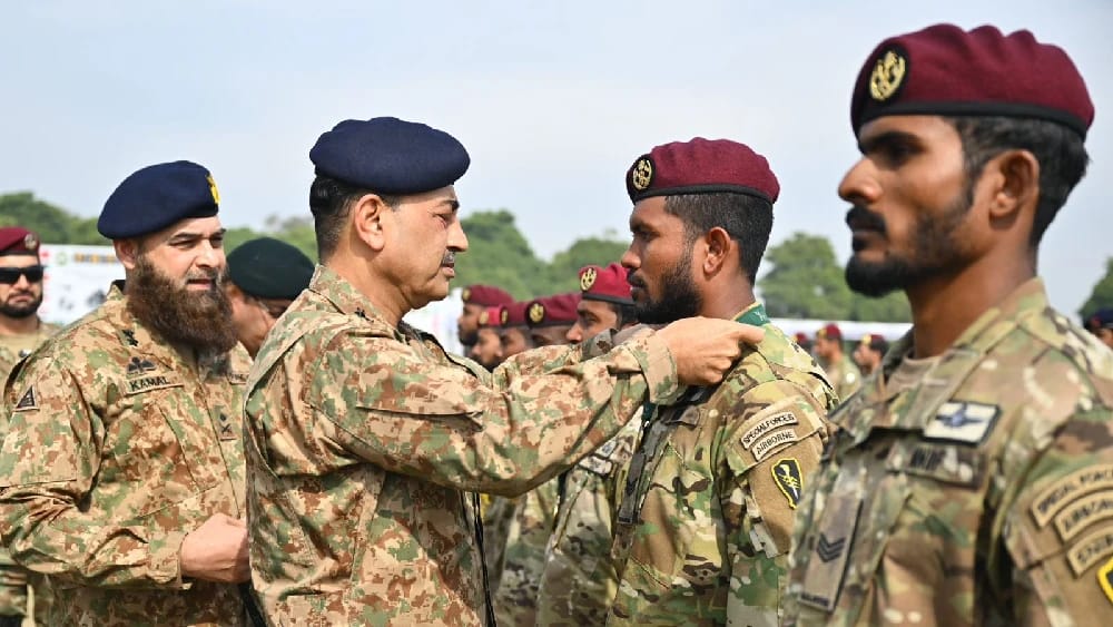 Field Marshal Asim Munir awards a medal to a soldier at the closing ceremony of the 9th International Pakistan Army Team Spirit (PATS) Competition in Kharian on Feb. 09, 2026. (Photo: ISPR)