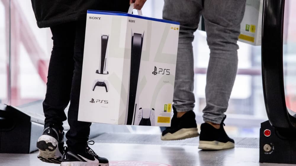 People buy the Playstation 5. (AFP)