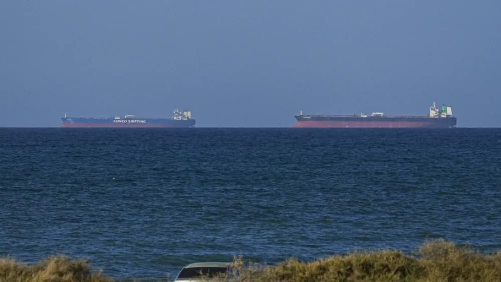 A view of the vessels passing through Strait of Hormuz following the two-week temporary ceasefire reached between the United States and Iran on the condition that the strait be reopened, seen in Oman on April 08, 2026. (AFP)