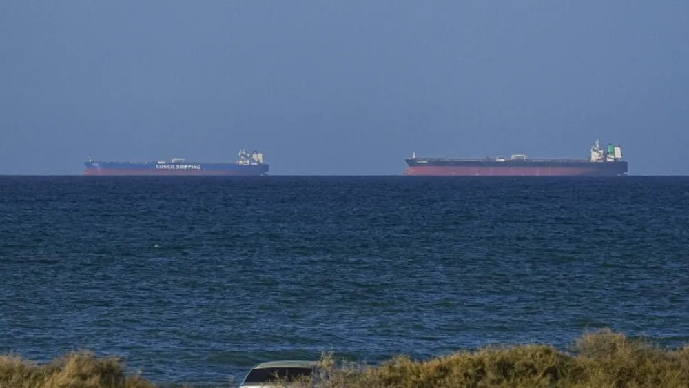 A view of the vessels passing through Strait of Hormuz following the two-week temporary ceasefire reached between the United States and Iran on the condition that the strait be reopened, seen in Oman on April 08, 2026. (AFP)
