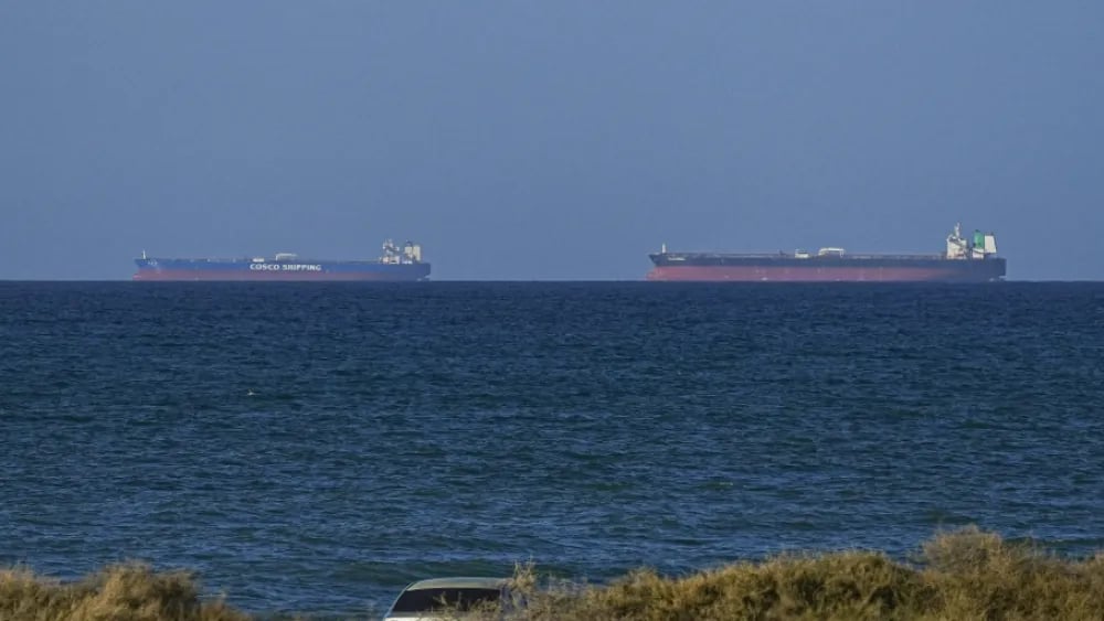 A view of the vessels passing through Strait of Hormuz following the two-week temporary ceasefire reached between the United States and Iran on the condition that the strait be reopened, seen in Oman on April 08, 2026. (AFP)