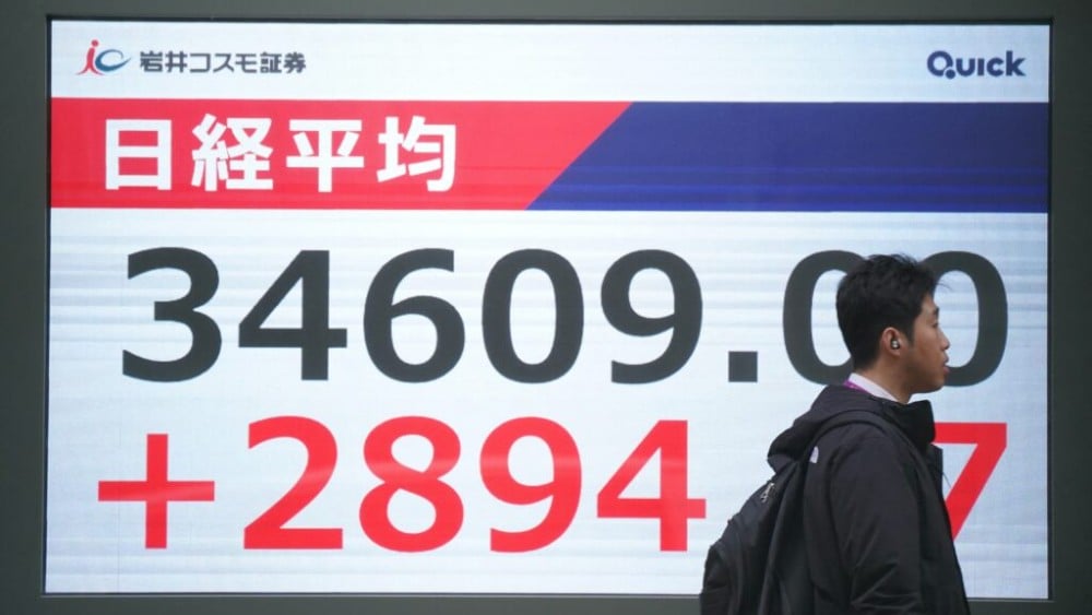 Tech firms rally, but Asian markets mixed, with eyes on US inflation