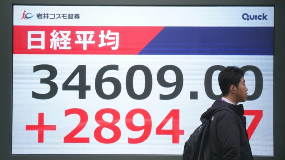 Tech firms rally, but Asian markets mixed, with eyes on US inflation