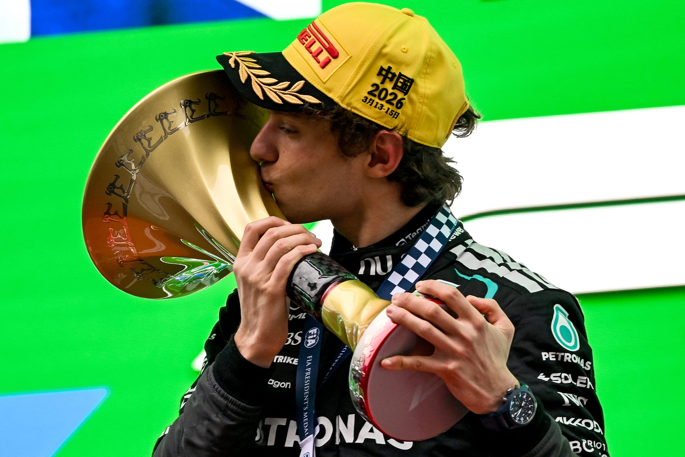 Winner Mercedes' Italian driver Kimi Antonelli celebrates on the podium after the Formula One Chinese Grand Prix at the Shanghai International Circuit in Shanghai on March 15, 2026. (AFP)