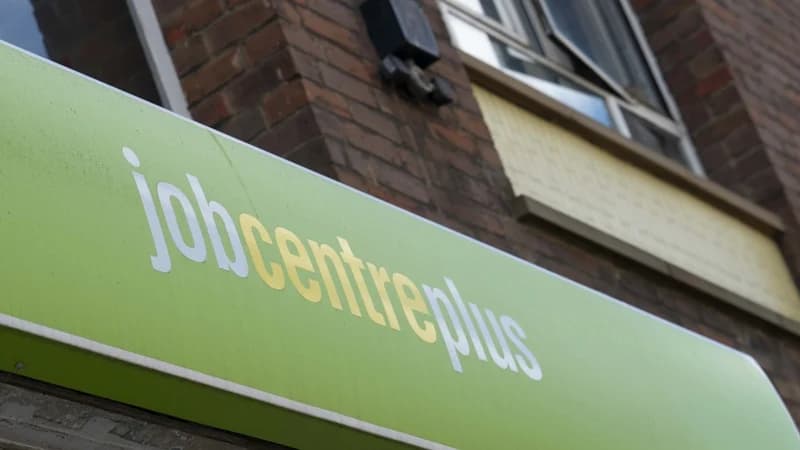 A view of a signboard of 'job center plus' in London, UK. (AFP)