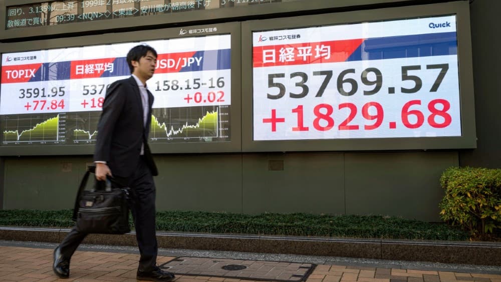 Oil plunges after Trump's Iran comments, Asian markets mixed