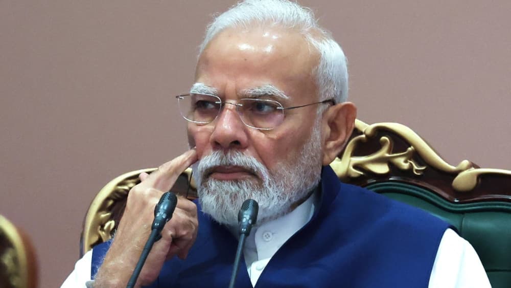In this pool photograph distributed by the Russian state agency Sputnik, India's Prime Minister Narendra Modi attends the 18th BRICS Summit in New Delhi on September 13, 2026. (AFP)
