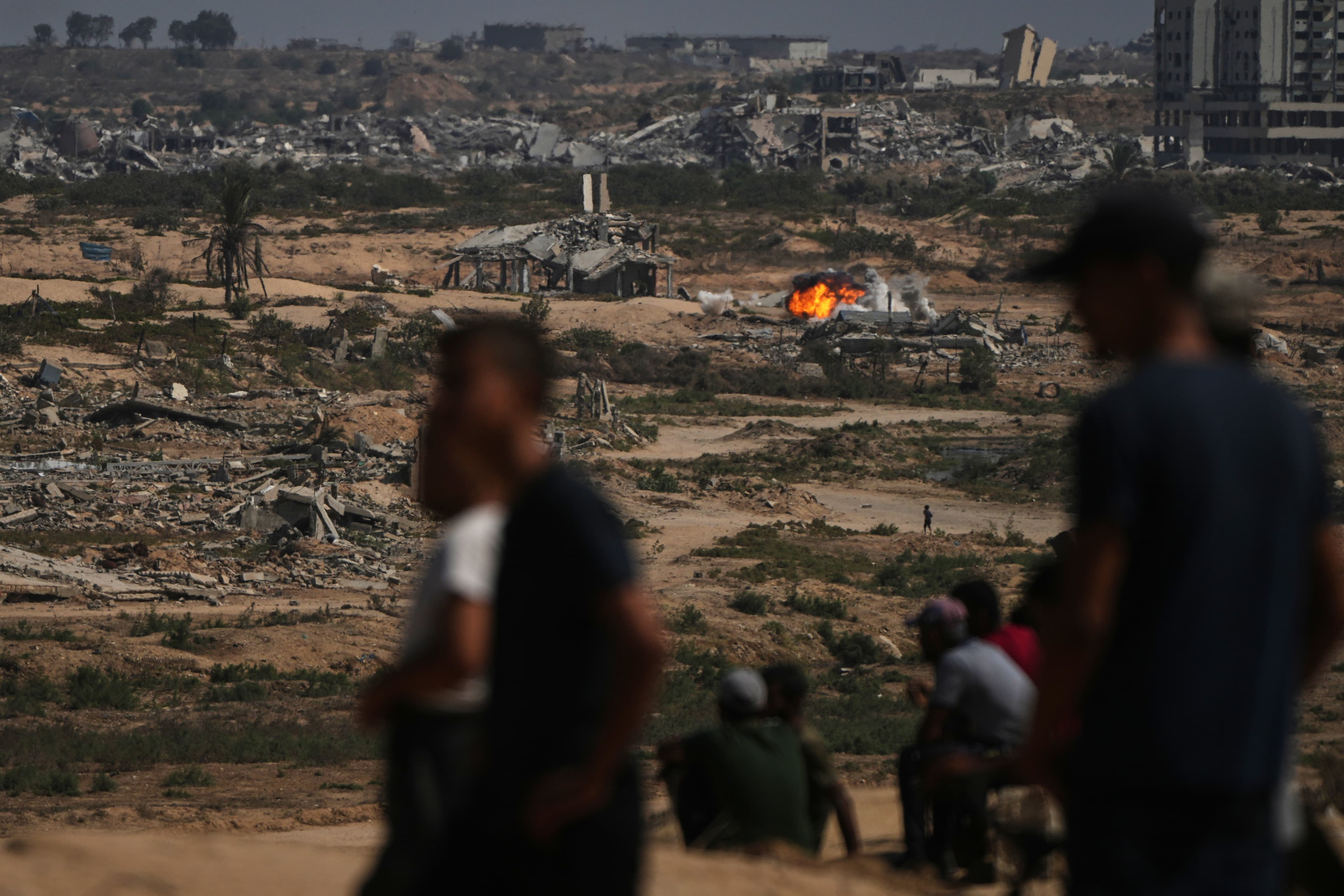 Fire and smoke rises following an Israeli army shelling in Nuseirat, central Gaza Strip, Saturday, Oct. 4, 2025.