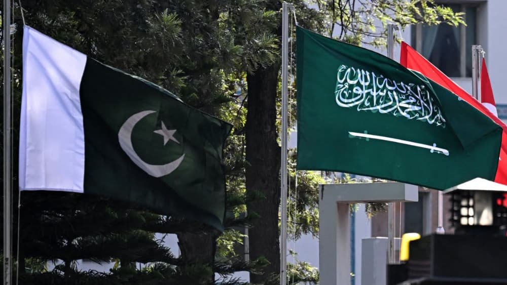 National flags of Pakistan (L) and Saudi Arabia flutter at Pakistan's Ministry of Foreign Affairs premises in Islamabad on March 29, 2026. (AFP)