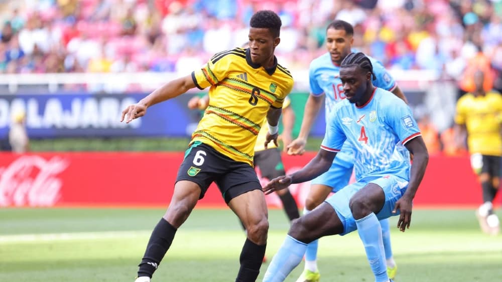 Richard King of Jamaica is challenged by Axel Tuanzebe of Congo DR during the FIFA World Cup 2026 Play-Off tournament final match between Congo DR v Jamaica at Estadio Guadalajara on March 31, 2026, in Zapopan, Mexico. (Photo: AFP)