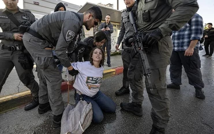 Dozens of protesters gather in front of the Israeli Parliament (Knesset) to demonstrate against a controversial bill that proposes the death penalty for Palestinian prisoners in West Jerusalem on March 31, 2026. (AFP)