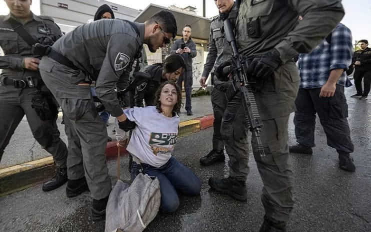 Dozens of protesters gather in front of the Israeli Parliament (Knesset) to demonstrate against a controversial bill that proposes the death penalty for Palestinian prisoners in West Jerusalem on March 31, 2026. (AFP)